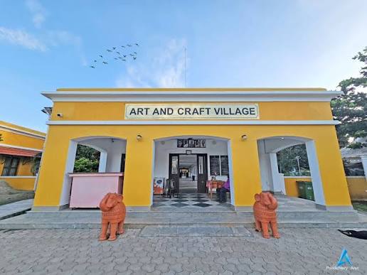 Yellow entrance building of the Art and Craft Village